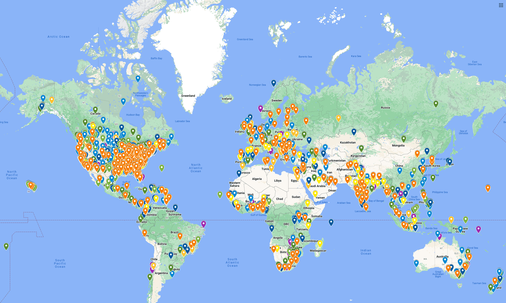 A world map with numerous colored markers indicating locations of various points of interest, highlighting hubs known for youth entrepreneurship education scattered across all continents.