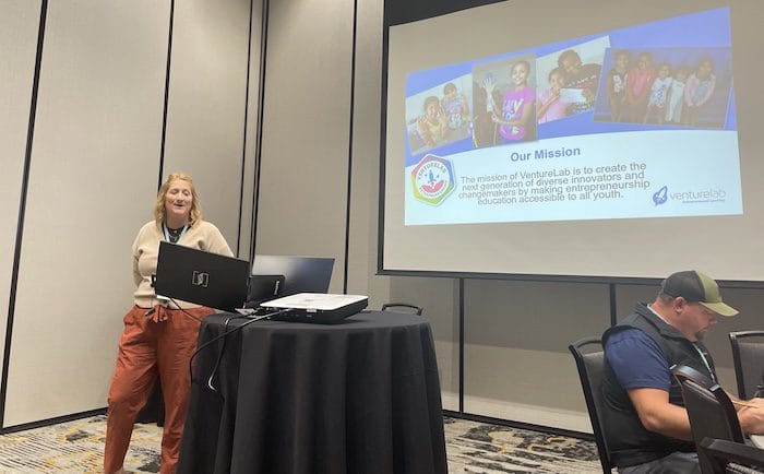 a presentation slide for the organization VentureLab, which focuses on youth entrepreneurship education